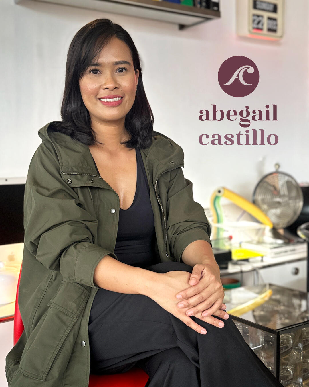 Woman in a creative studio, with trusted publishing house logos like manila bulletin, the novice magazine ph, and the manila times